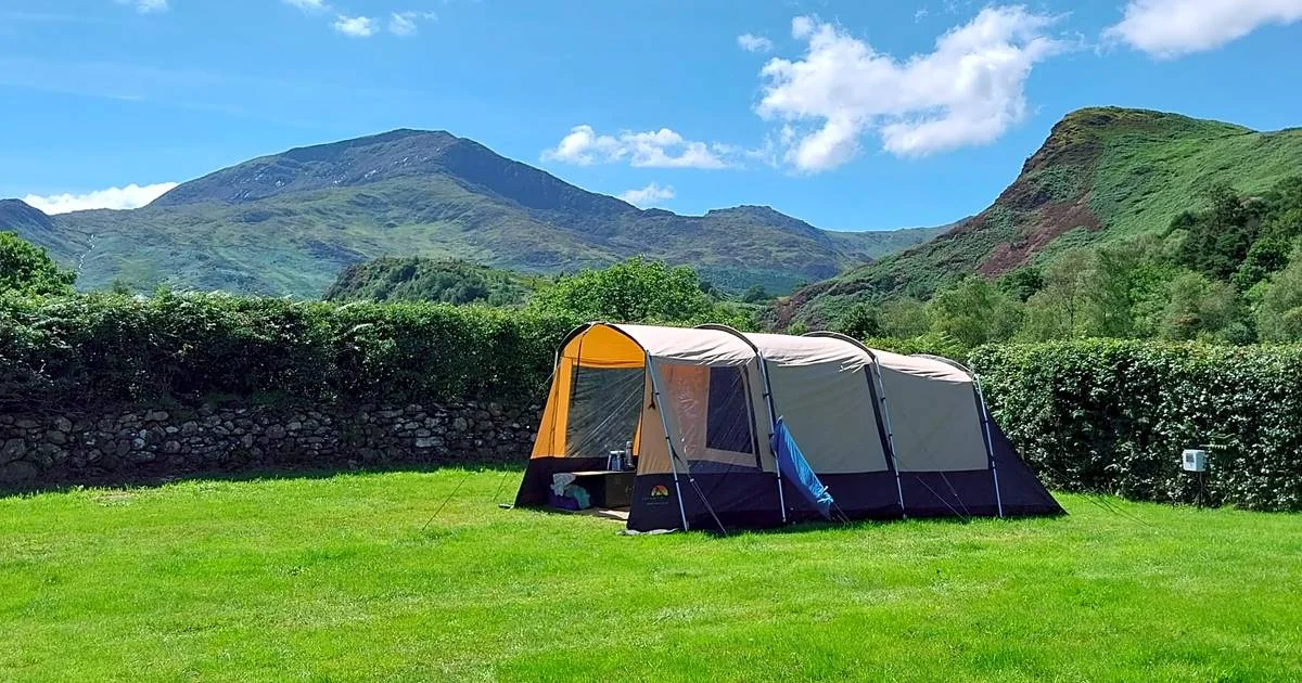 Grass camping pitch at Cae Du Campsite
